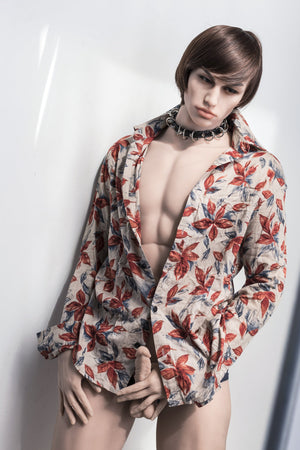 Male sex doll a floral patterned shirt against a white background